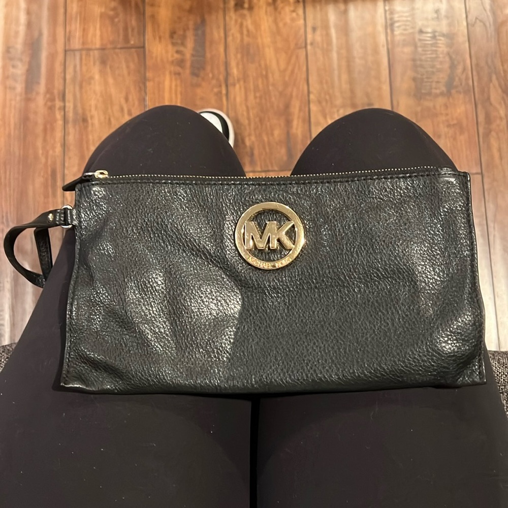 Michael Kors clutch with small strap